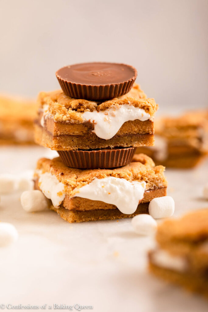 pb cup s'mores stacked with more peanut butter cups on a marble surface