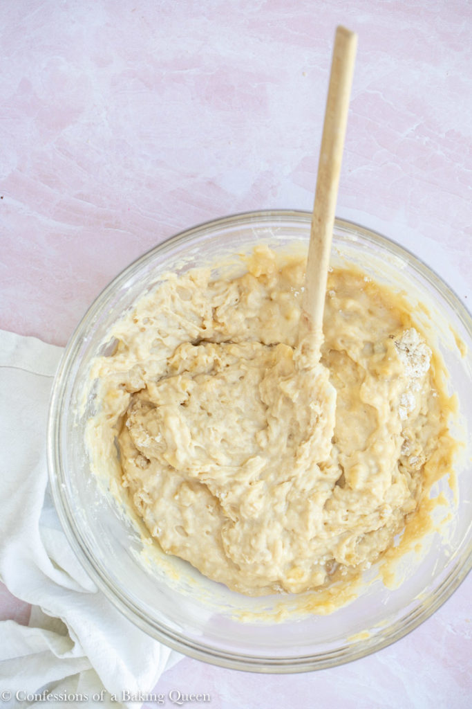 banana bread batter just mixed in a large glass bowl