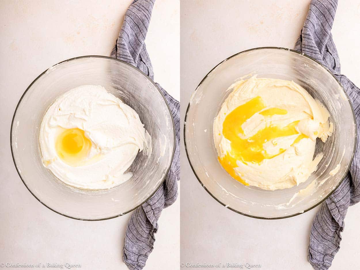 egg mixed into butter sugar mixture in an glass bowl on a light surface with a blue linen.