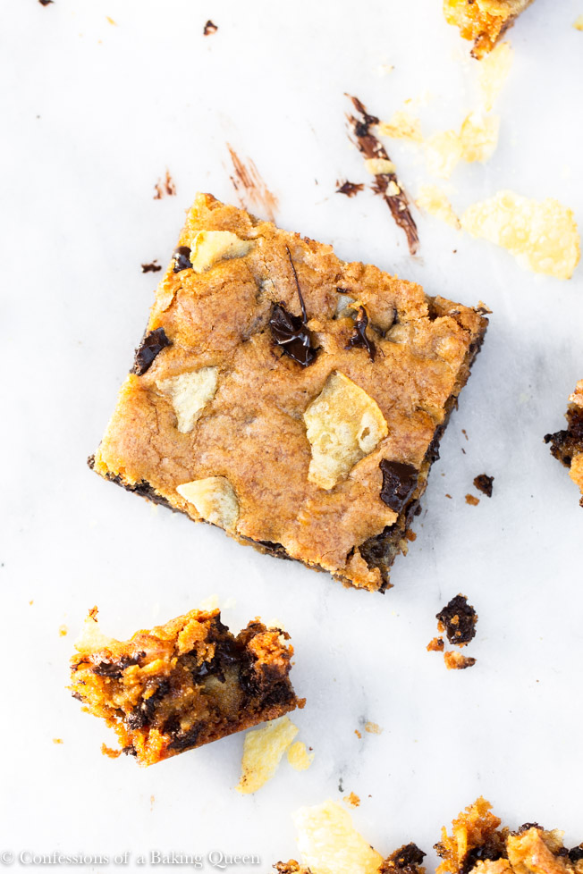 potato chip chocolate chip blondie on a white marble surface