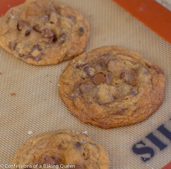 Salted Caramel Chocolate Chip Cookies baked on a silpat liner 