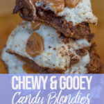 chewy candy bar blondies stacked on top of each other