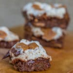 chewy candy bar blondies on a wood board