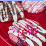 Strawberry Red Velvet swirl cookies on a red cake plate