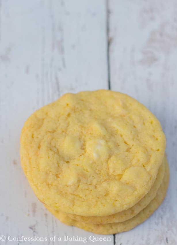 Chewy Lemon Cookies stacked on white background