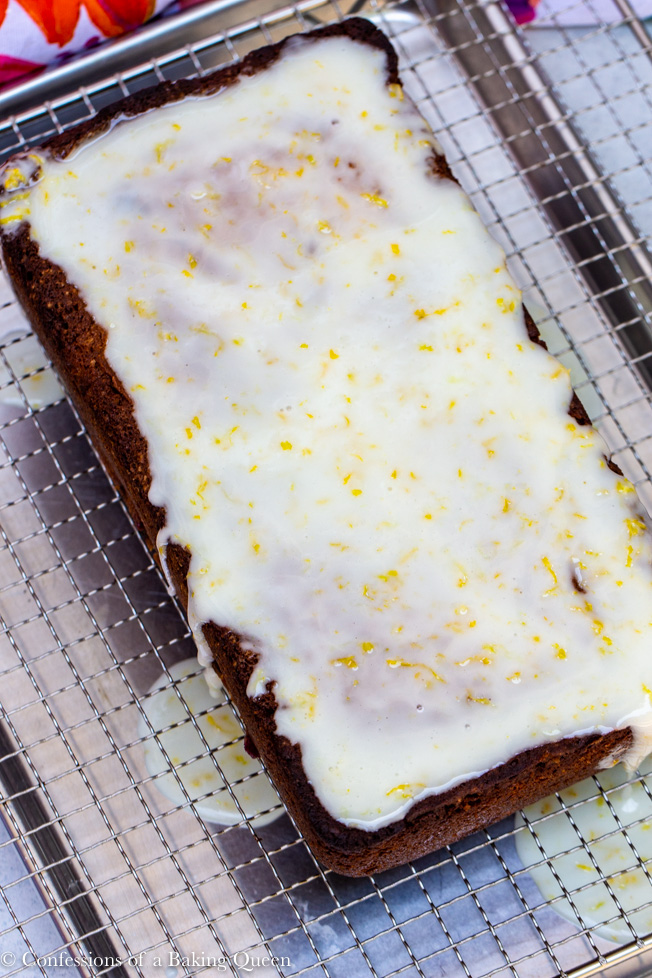 lemon glaze drizzled on top of raspberry lemon loaf cake