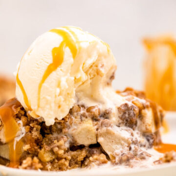 cropped-salted-caramel-apple-pie-bars-with-ice-cream-half-eaten-on-a-plate-1-of-1.jpg
