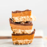 salted millionaires shortbread stacked on a white surface