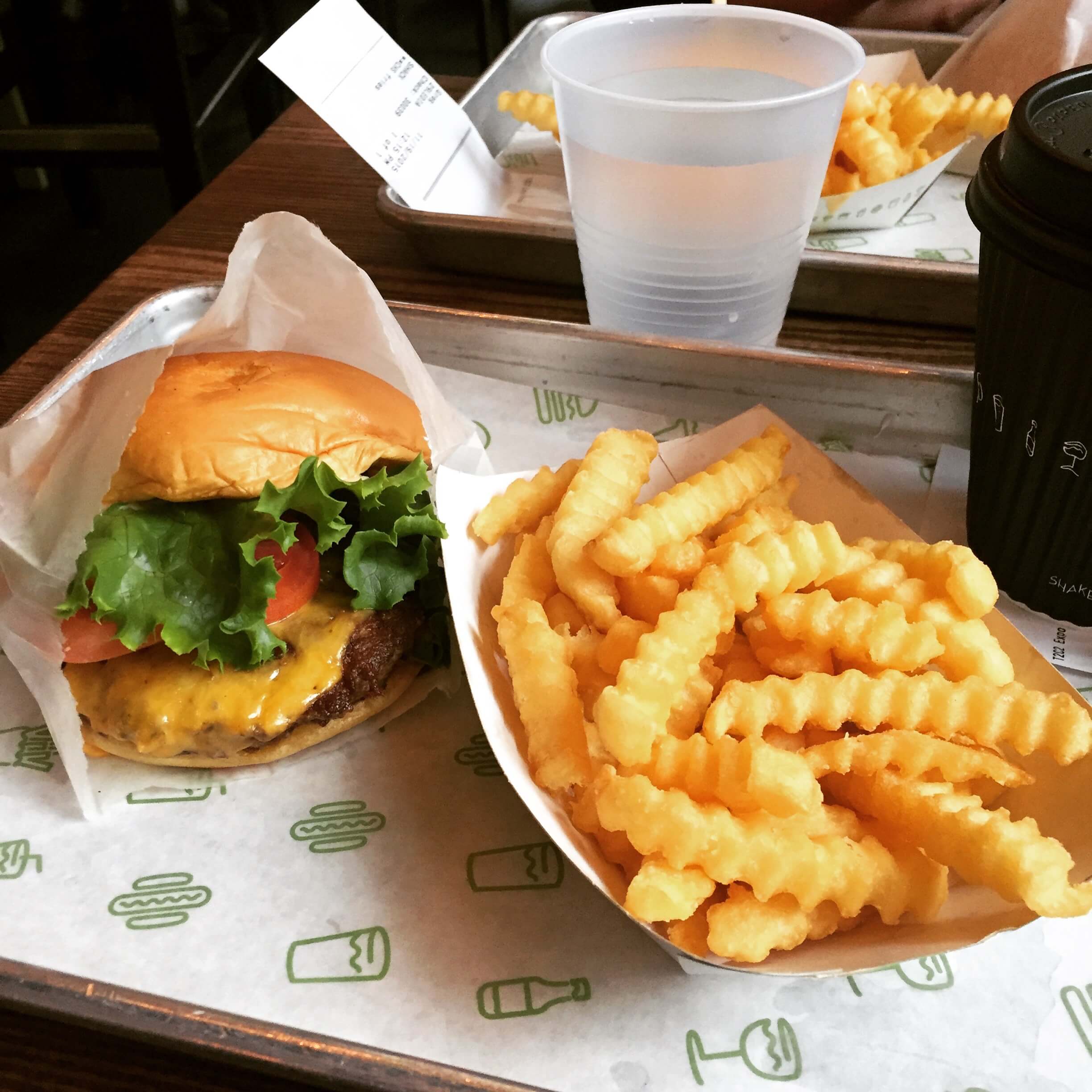 burger and fries on a tray from Shake Shack
