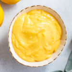 overhead view of lemon curd recipe in a small bowl