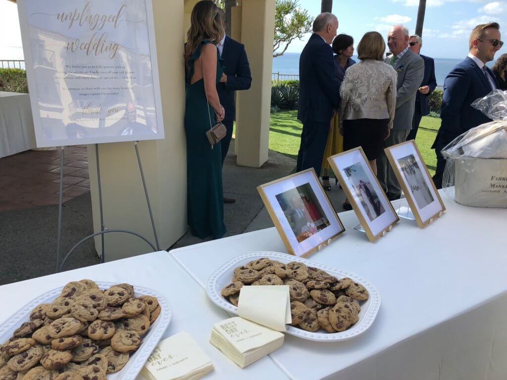 Cookies at Sisters Wedding  on a table outside by the beach