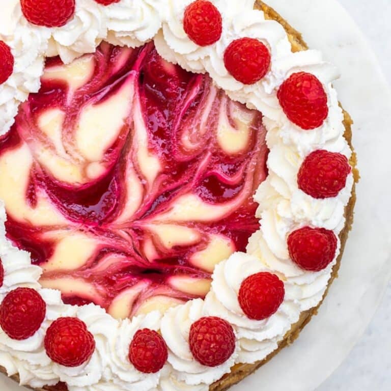 overhead shot of a raspberry swirl lemon cheesecake