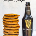 stack of guinness gingerbread cookies next to a bottle of guinness