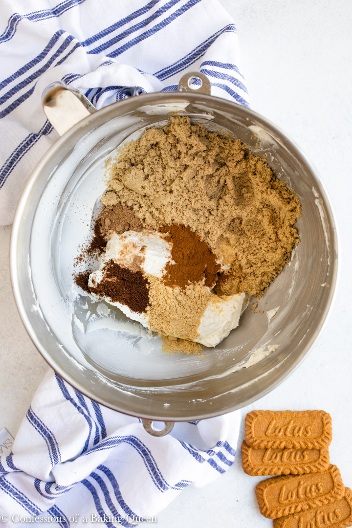 brown sugar and spices added to cream cheese for a gingerbread cheesecake recipe
