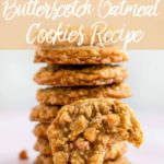 butterscotch oatmeal cookies baked and stacked on a pink surface