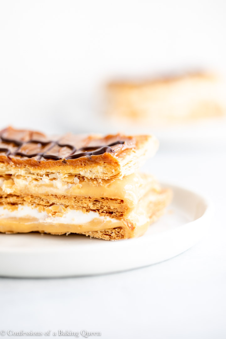 slices of dulce de leche millie feuille on round plates