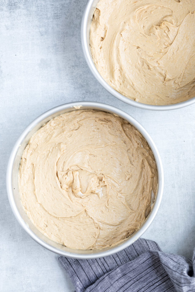 coffee cake batter in two round pans