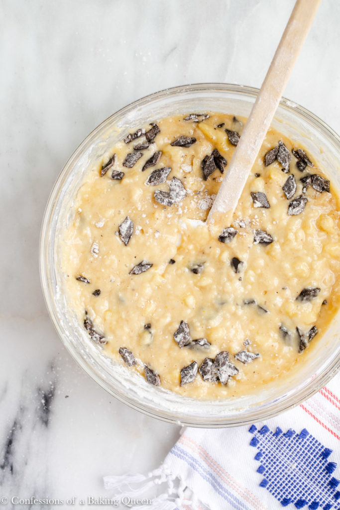 banana chocolate chip muffins batter in a medium glass bowl