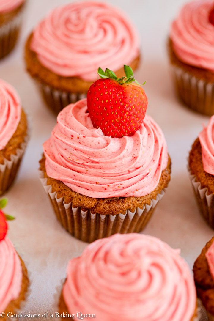 strawberry cupcakes on a pink background