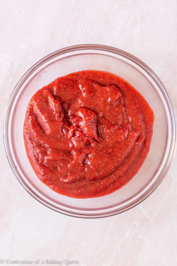reduced strawberry puree in a small glass bowl