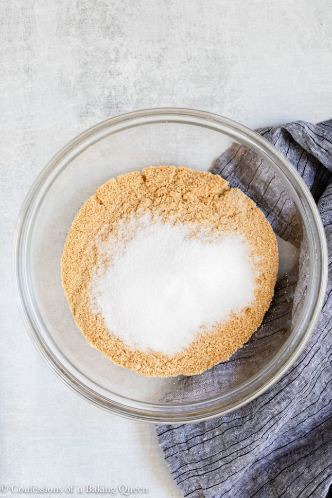graham cracker and sugar in a glass bowl