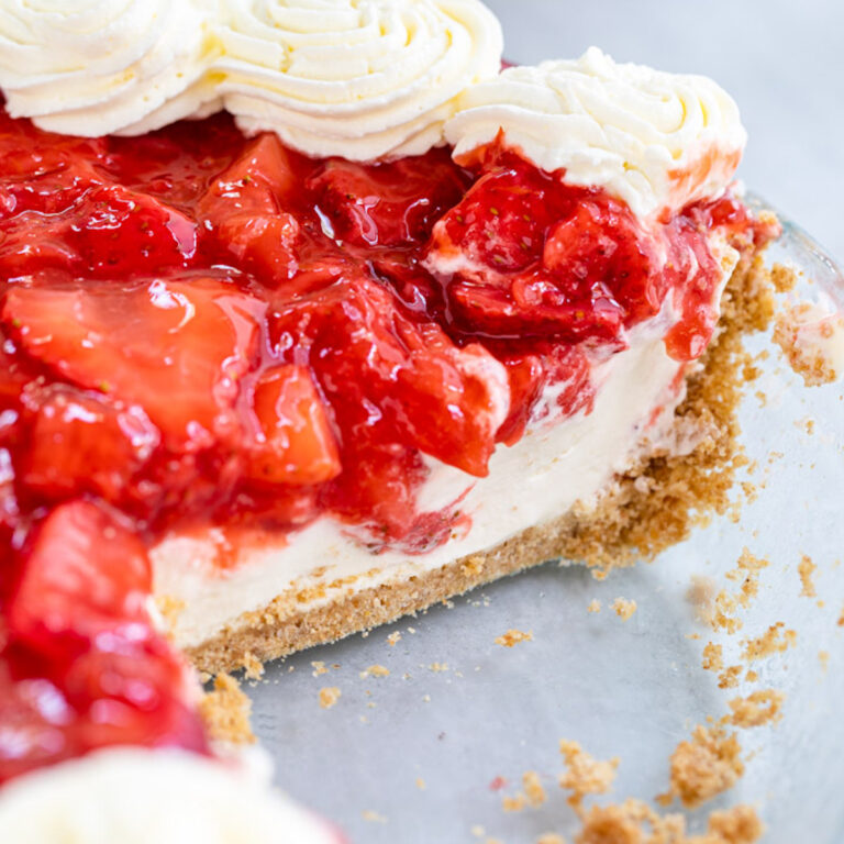 strawberry cream cheese pie with a slice missing