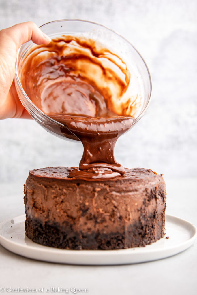 chocolate ganache poured on top of chocolate cheesecake