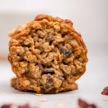 up close of a Oatmeal Cranberry Cookie on a white surface