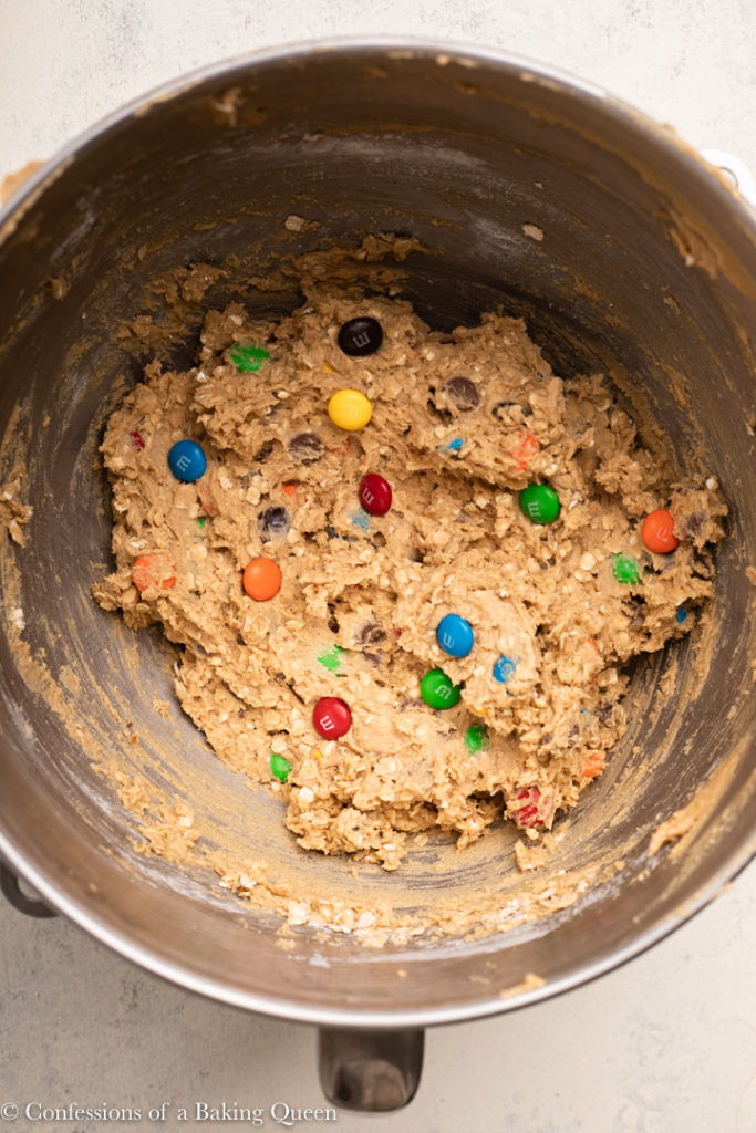 monster cookie dough in a metal mixing bowl