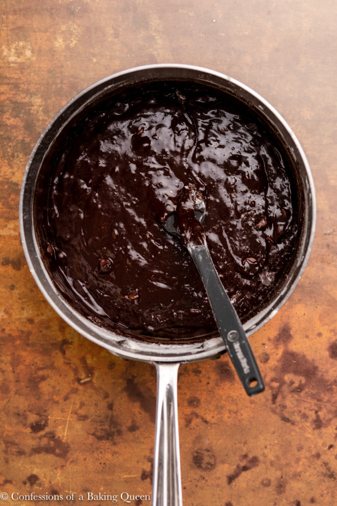 brownie batter in a metal pan