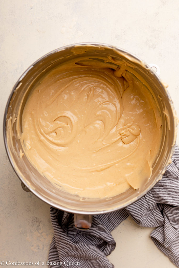 peanut butter cheesecake batter in a metal bowl