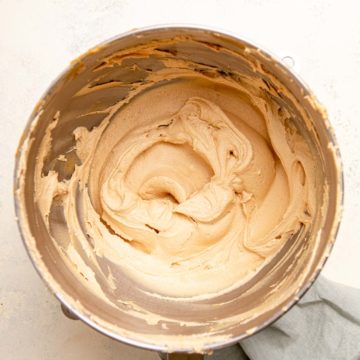 peanut butter frosting in a metal bowl