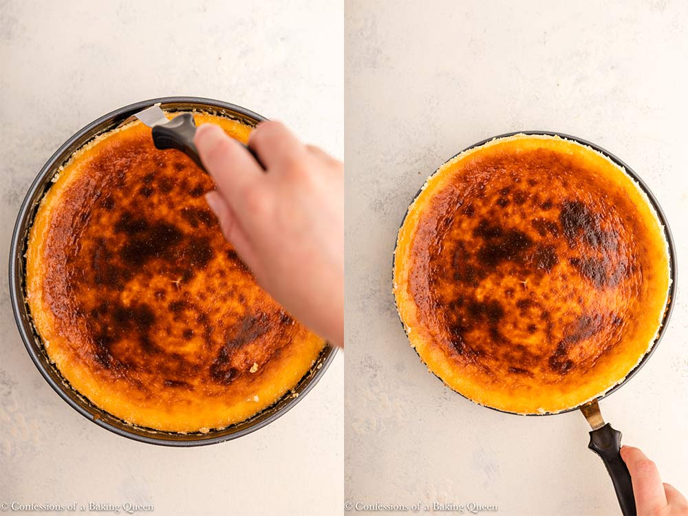 angled spatula separating cheesecake from a springform pan