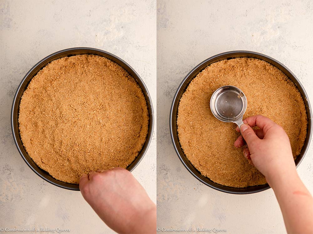 hand pressing graham cracker crust into a springform pan