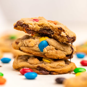 three m&m cookies stacked on top of each other