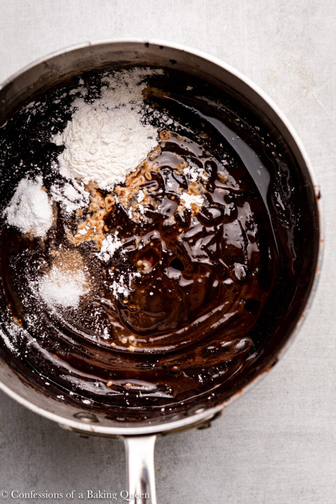 baking soda, salt, and cornstarch added to brownie batter in a large pot