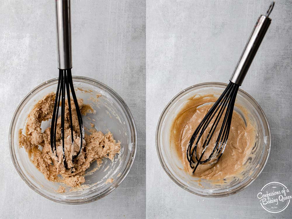 brown butter in a glass bowl mixed with powdered sugar using a whisk sitting on a grey surface