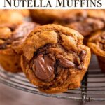 up close of nutella pumpkin muffin on a wire rack on a light brown surface