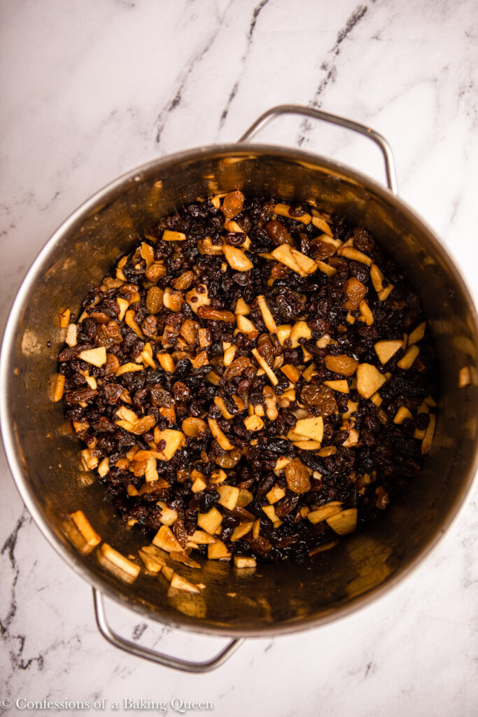 mincemeat ingredients in a metal pot on a marble surface