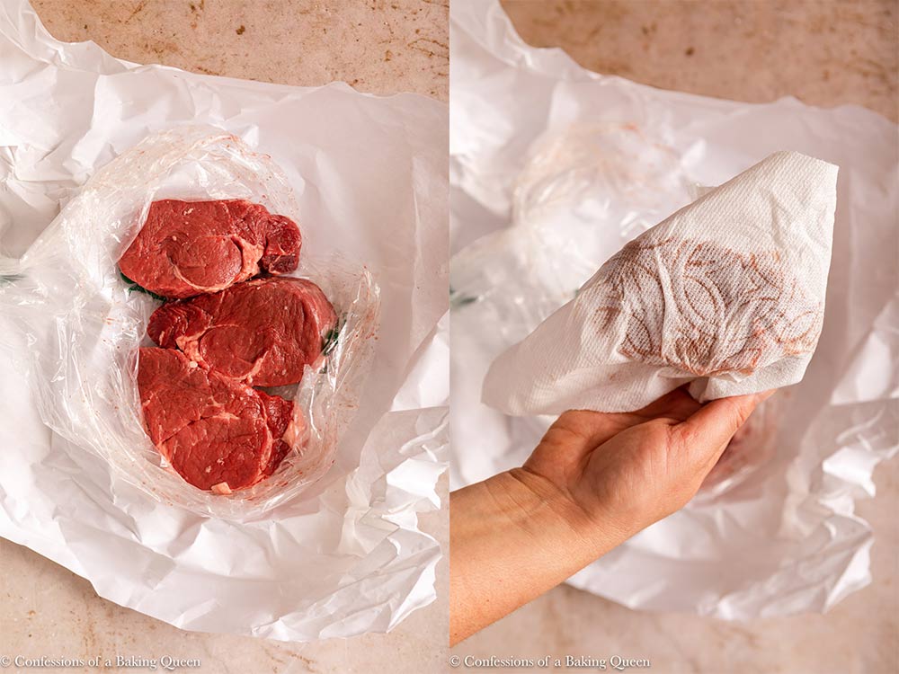 three pieces of filet mignon and then dried with a paper towel on a light brown background