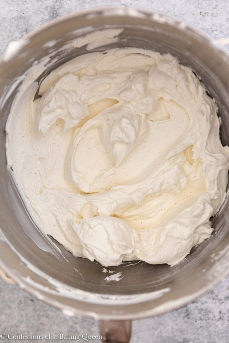 close up of vanilla Swiss meringue buttercream on a light grey surface