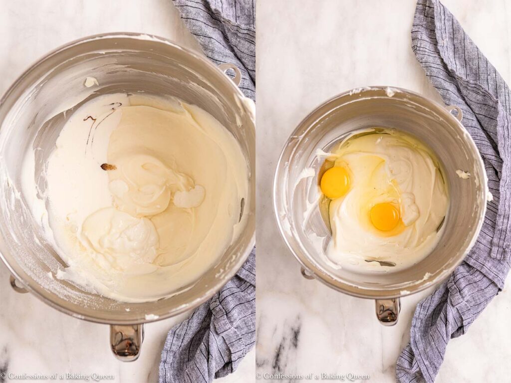 heavy cream, sour crea, and vanilla bean paste added to cheesecake batter then eggs added in a metal bowl on a white marble surface with a blue linen
