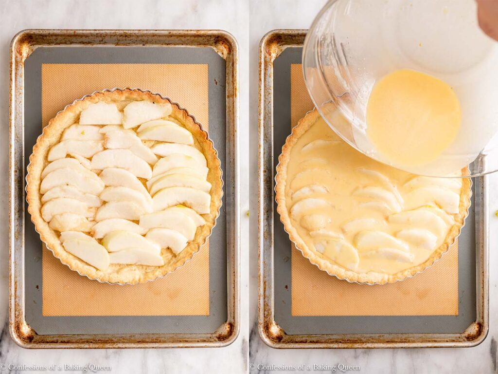 sliced pears added to tart shell and custard poured on top sitting on a silpat lined baking sheet on a white marble surface