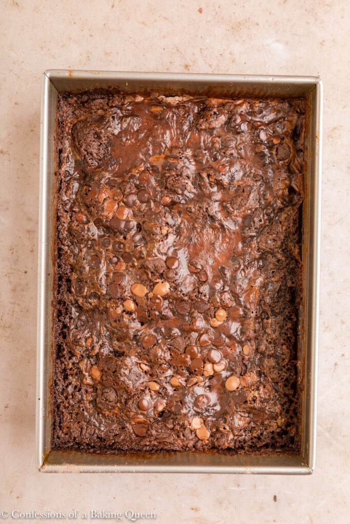 chocolate dump cake cooling after baking on al light brown surface