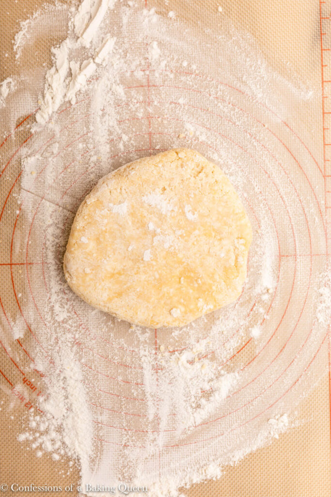 sweet shortcrust pastry dough on a floured work surface