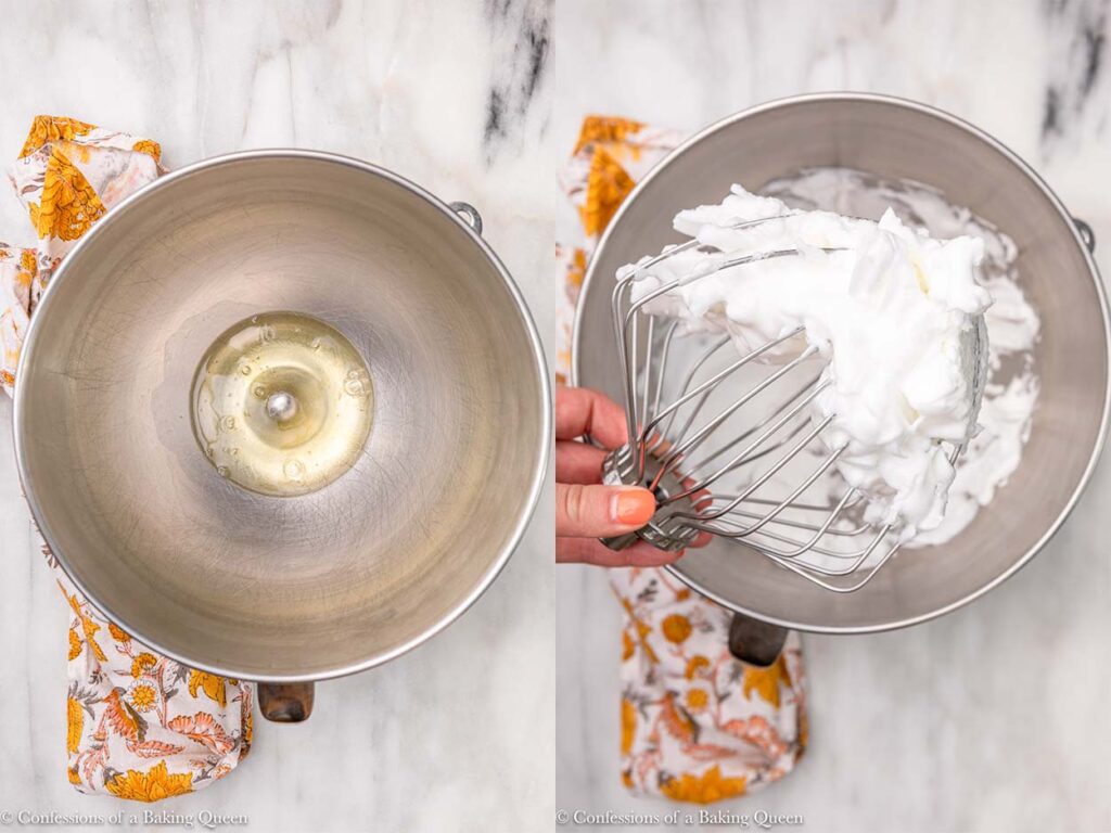 egg whites whipped into stiff peaks in a metal bowl with a wire whisk on a white marble surface with a yellow flowery linen