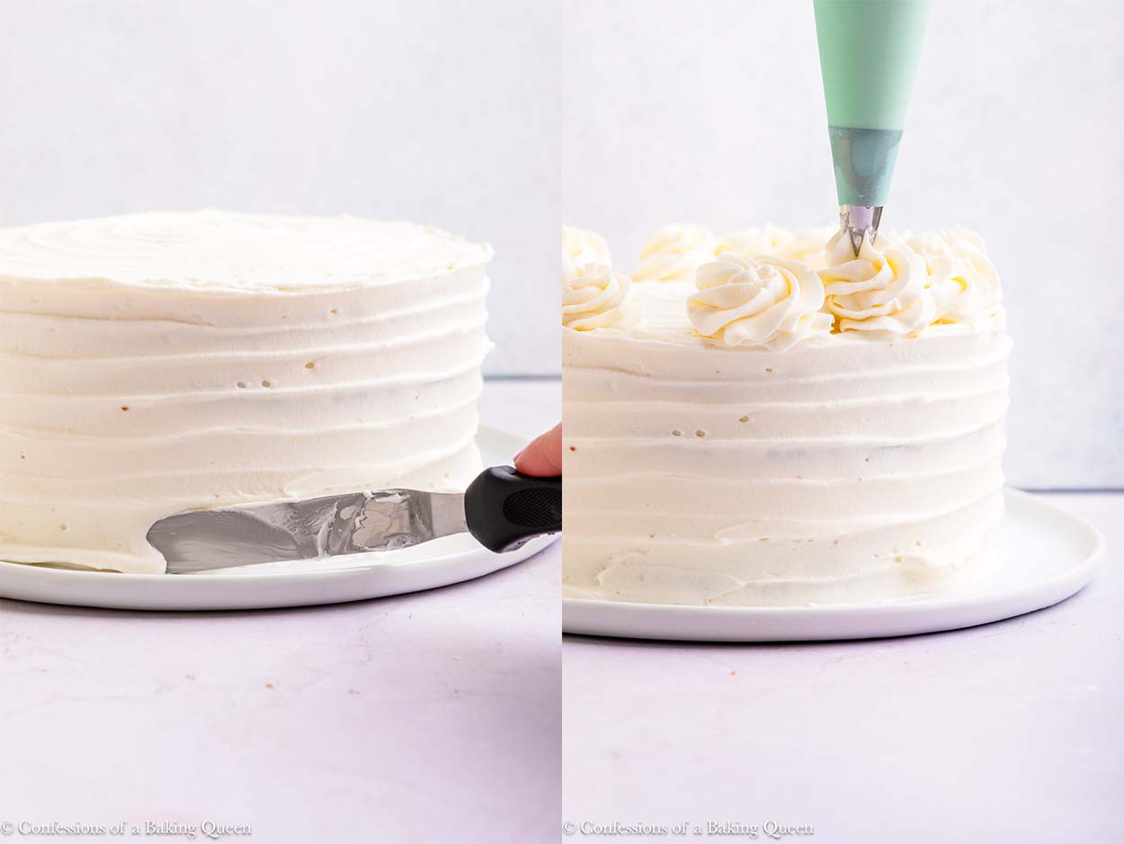 whipped cream cream cheese frosting spread on to cake and piped on top on a white plate on a light surface