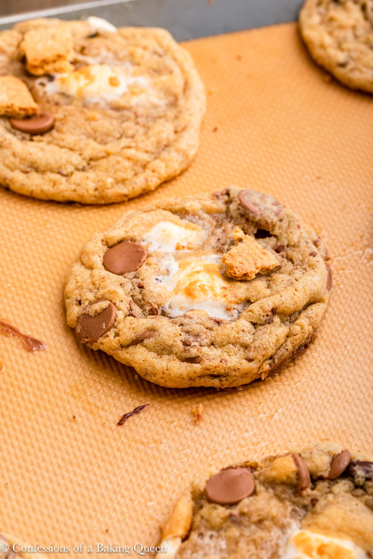 S'mores cookies on a baking mat.